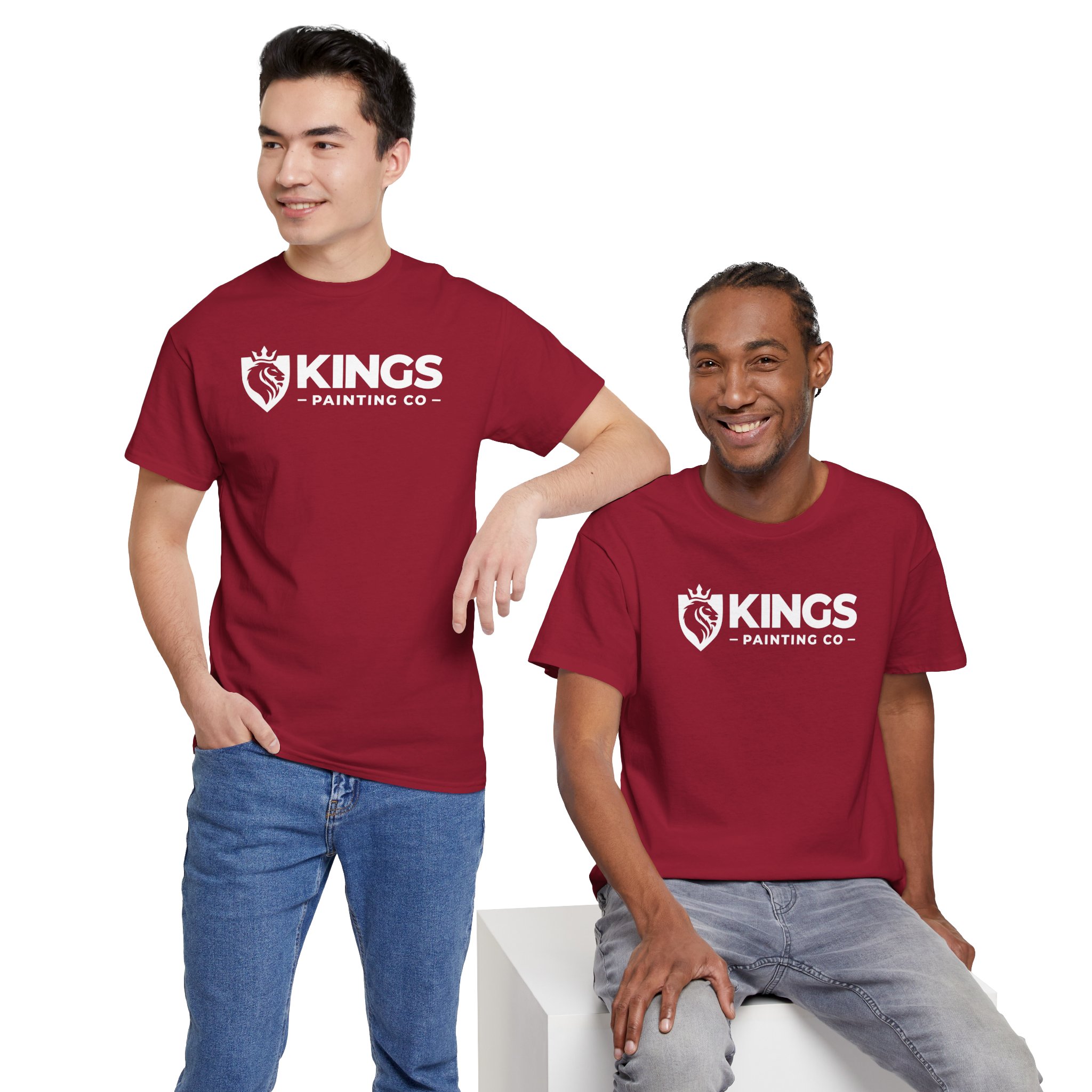 Two men wearing matching Kings Painting Co. Logo T‑Shirts (Classic) by Gildan Ultra Cotton (G5000)—one standing with a hand in his pocket and the other sitting and smiling—pose against a white background.